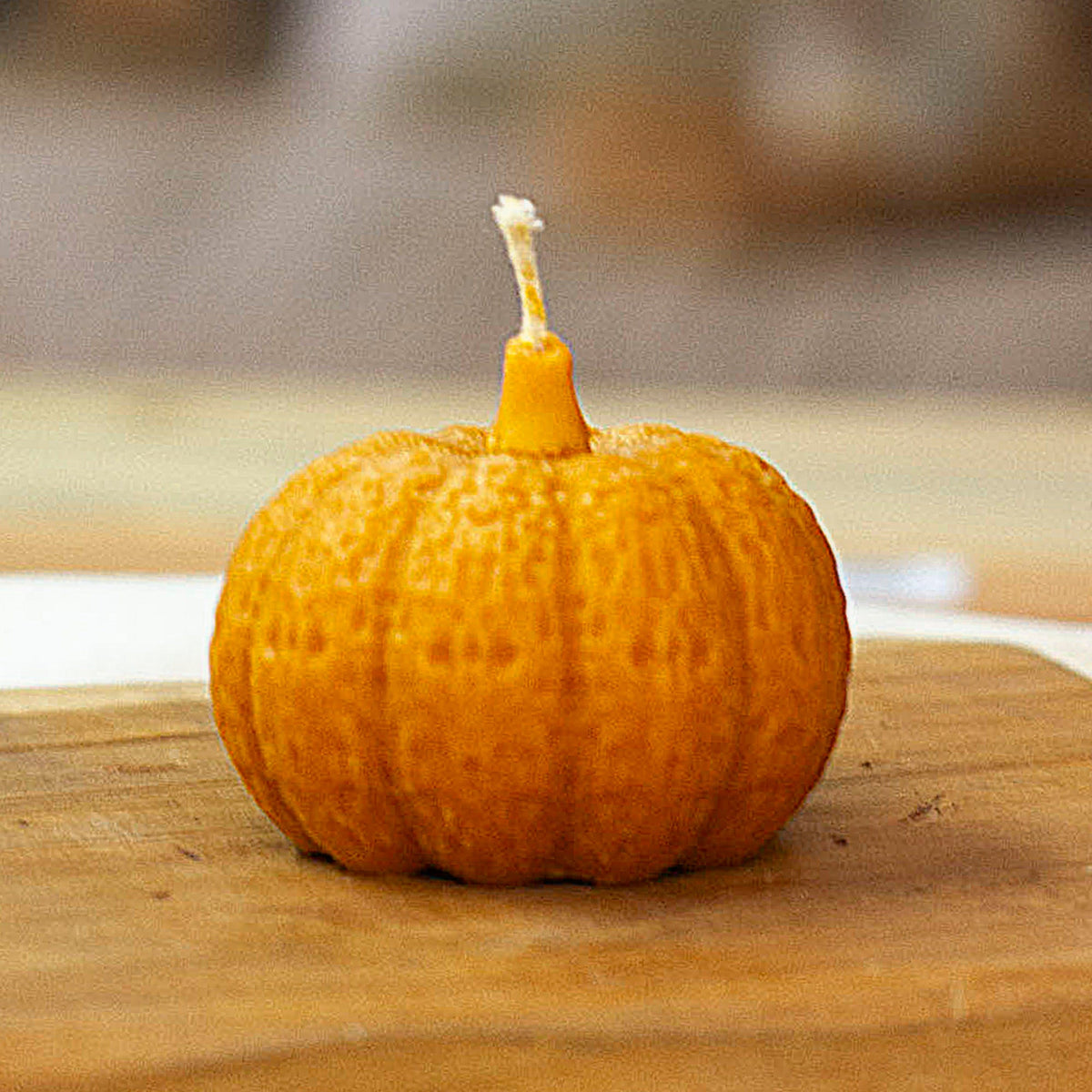 Handcrafted Pumpkin-Shaped Orange Wax Candle from Mexico - Pumpkin Illumination